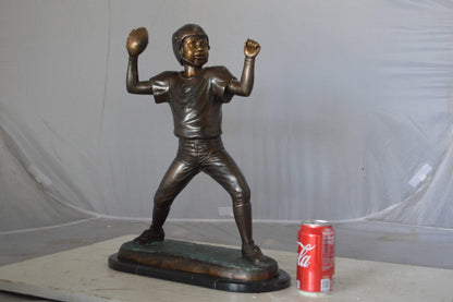 Young Quarterback bronze statue - Size: 14"L x 6"W x 20"H.