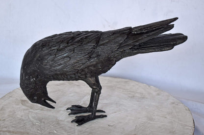 Raven Looking Down Bronze State - Size: 19"L x 5"W x 11"H.