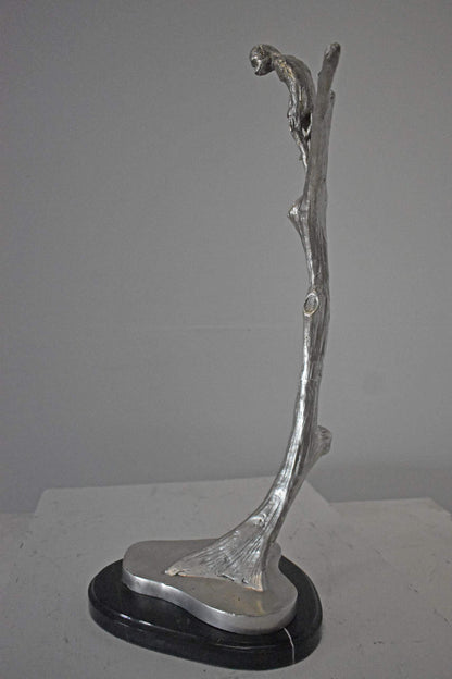 Monkey Resting on a Tree Silver Finish Bronze Statue - Size: 12" x 13" x 27"H.