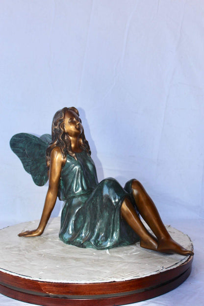 Fairy angel sitting peacefully bronze statue -  Size: 27"L x 12"W x 16"H.