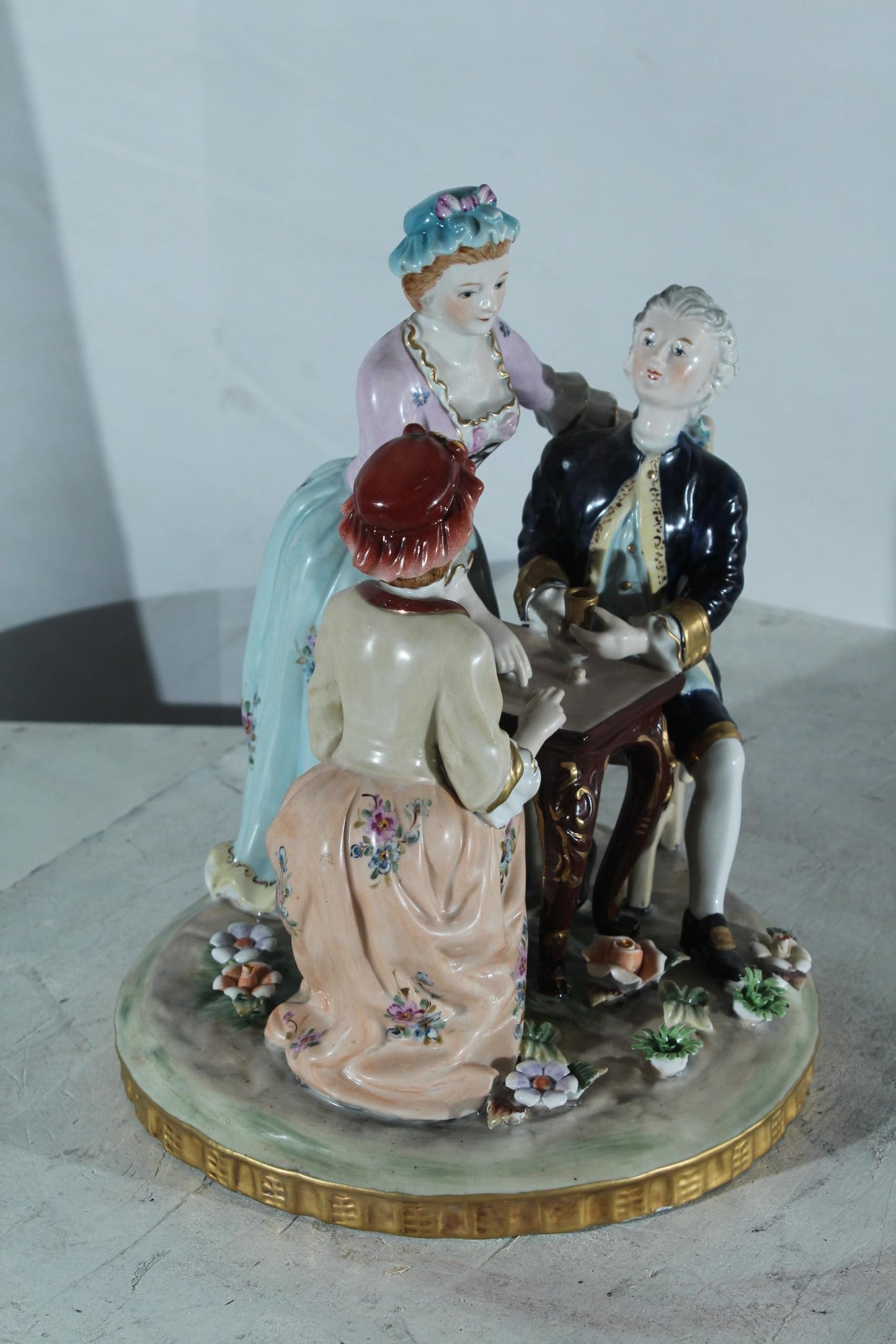 NIFAO Porcelain Figurine Group at Table with Cups 10"x10"x13"H