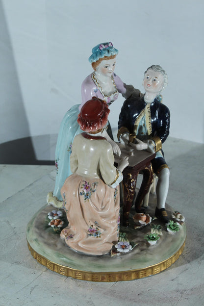 NIFAO Porcelain Figurine Group at Table with Cups 10"x10"x13"H