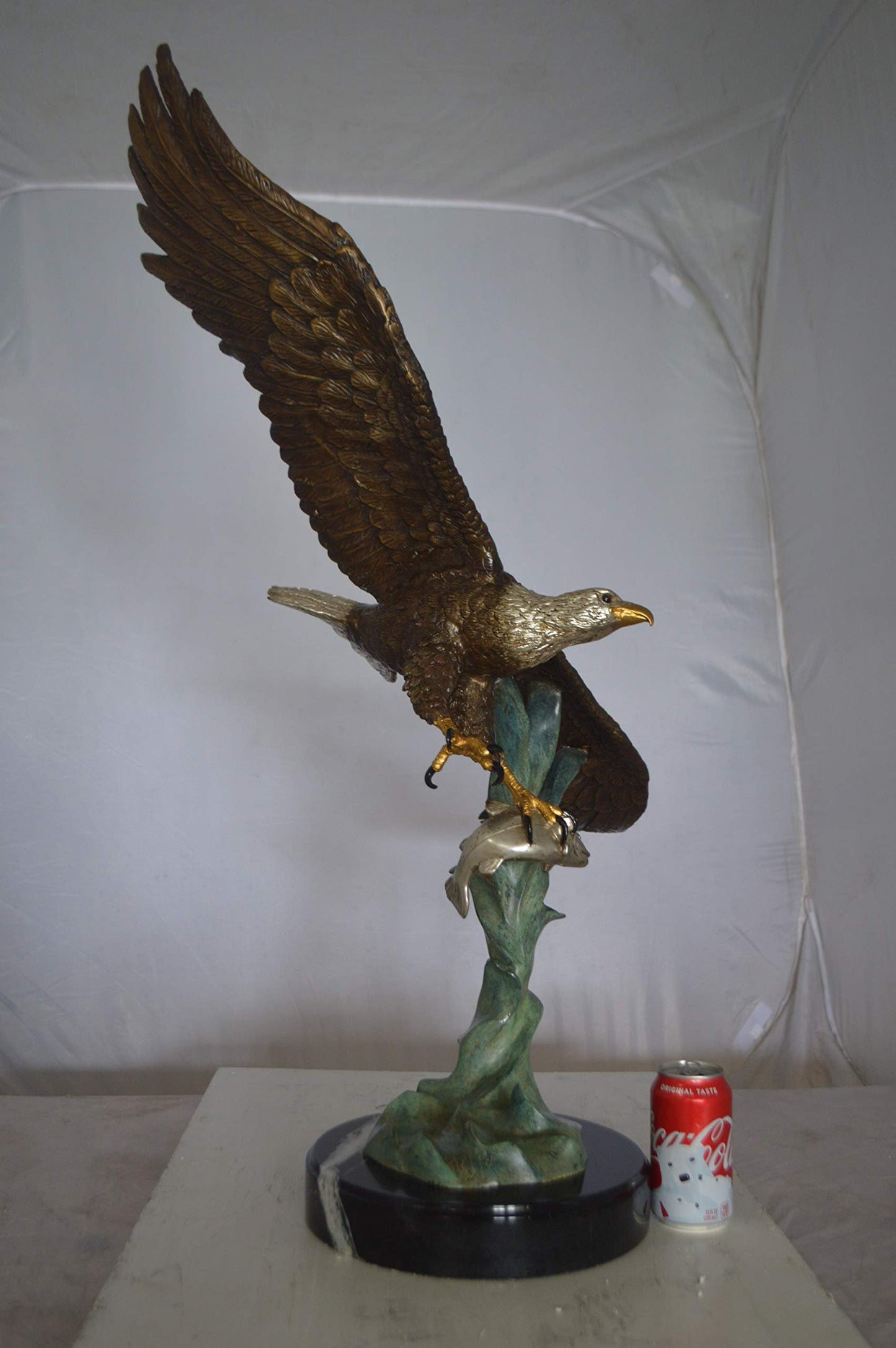 Eagle Flying With His Pray Bronze Statue -  Size: 32"L x 15"W x 33"H.