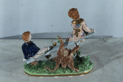 NIFAO Porcelain boy and Girl on Seesaw Figurine Vintage Style 10"x4"x9"H