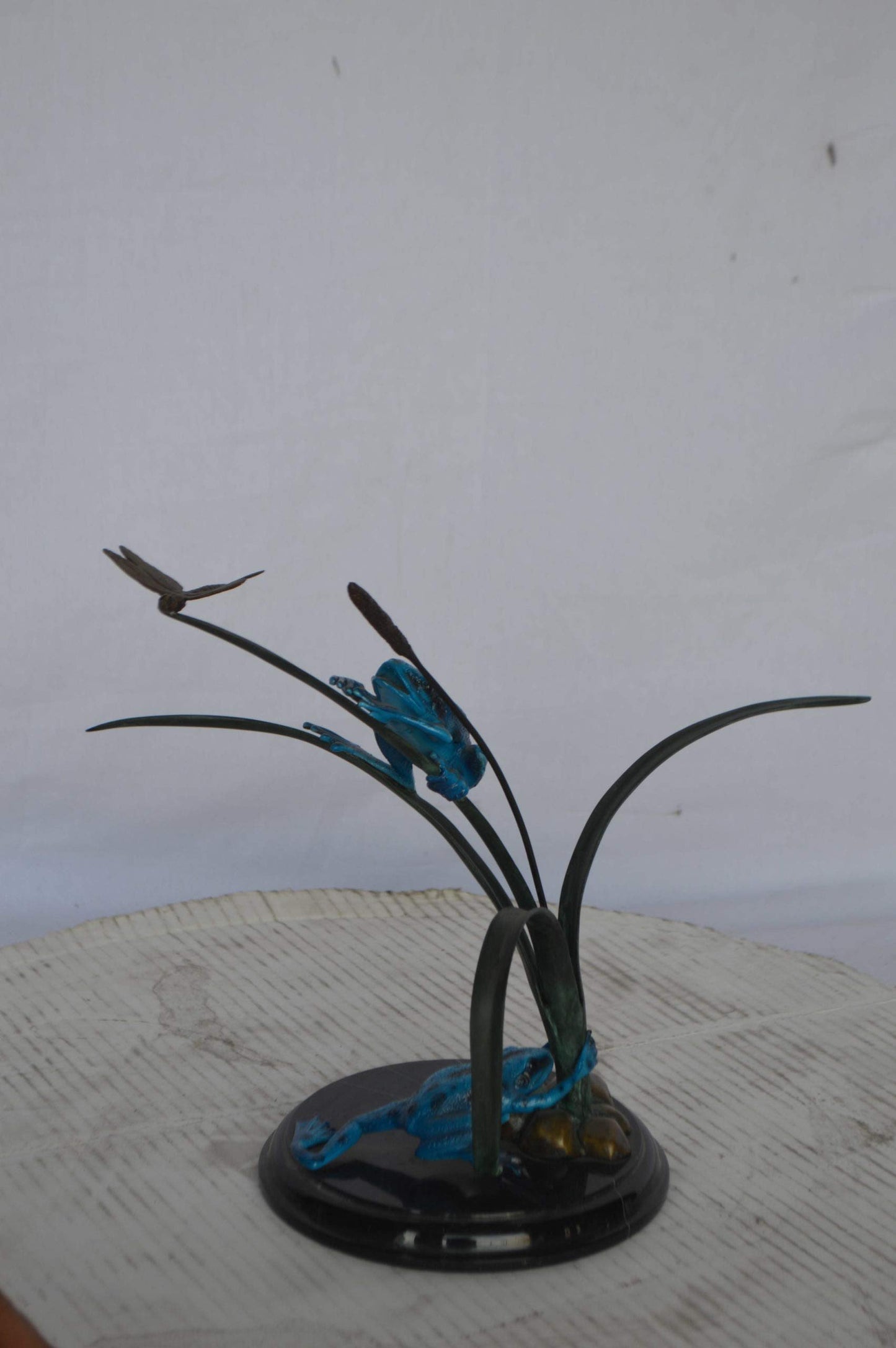 Two Blue Frogs catching a dragonfly Bronze Statue - Size: 14"L x 8"W x 12"H.