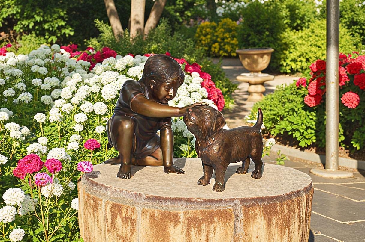Boy and Dog Bronze Statue - Size: 30"L x 18"W x 18"H.