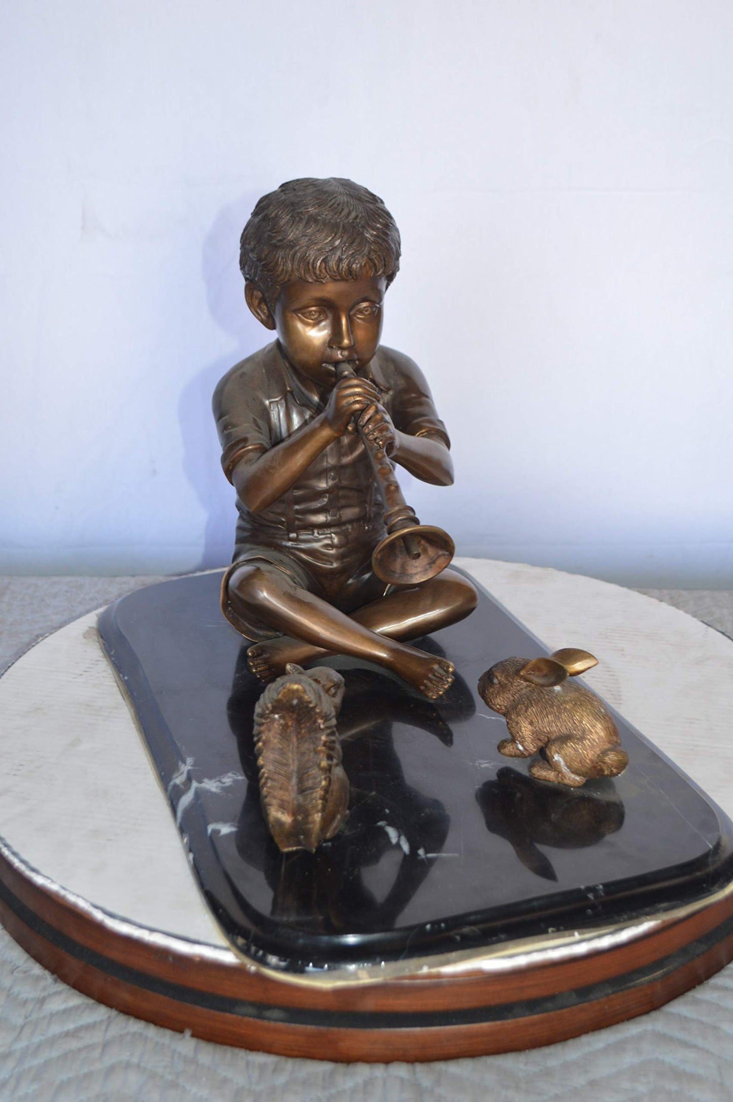 Boy With Rabbit And Squirrel Bronze Statue -  Size: 22"L x 13"W x 16"H.