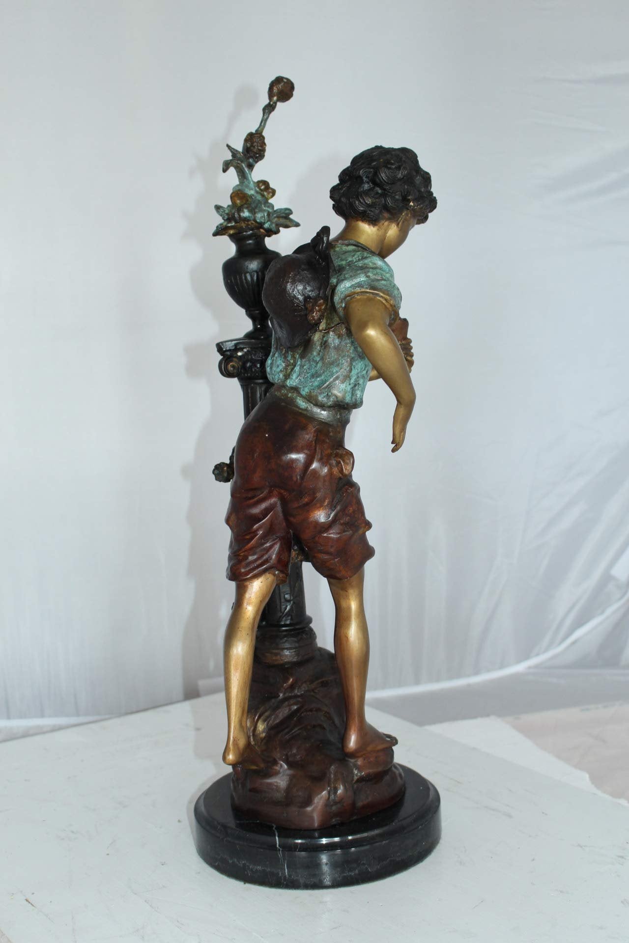 Les Amenes Boy Bronze Statue -  Size: 9"L x 8"W x 25"H.