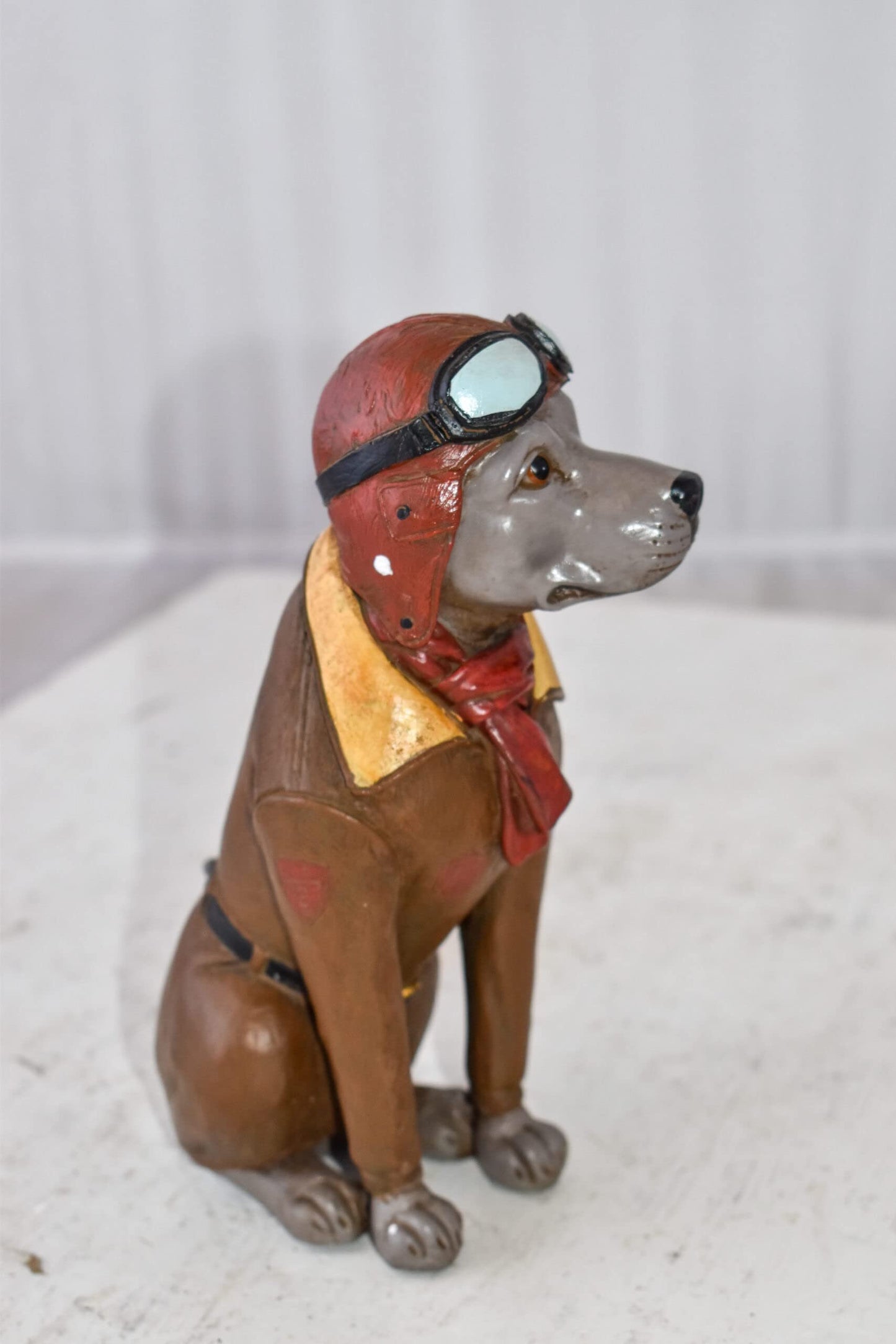 A Happy Dog Dressed Like a Pilot Resin Statue Size: 3" x 4" x 8"H