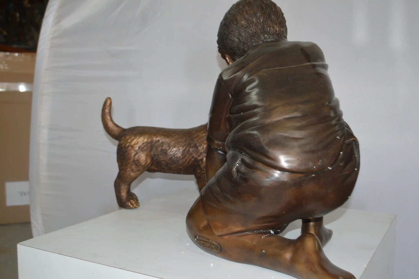 Boy and Dog Bronze Statue - Size: 30"L x 18"W x 18"H.