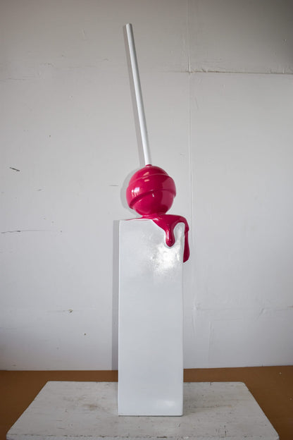Red Lollipop Mounted on A White Pedestal Resin Statue Size: 10" x 10" x 59"H