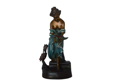 Lady holding a bird bronze statue - Size: 10"L x 9"W x 20"H.