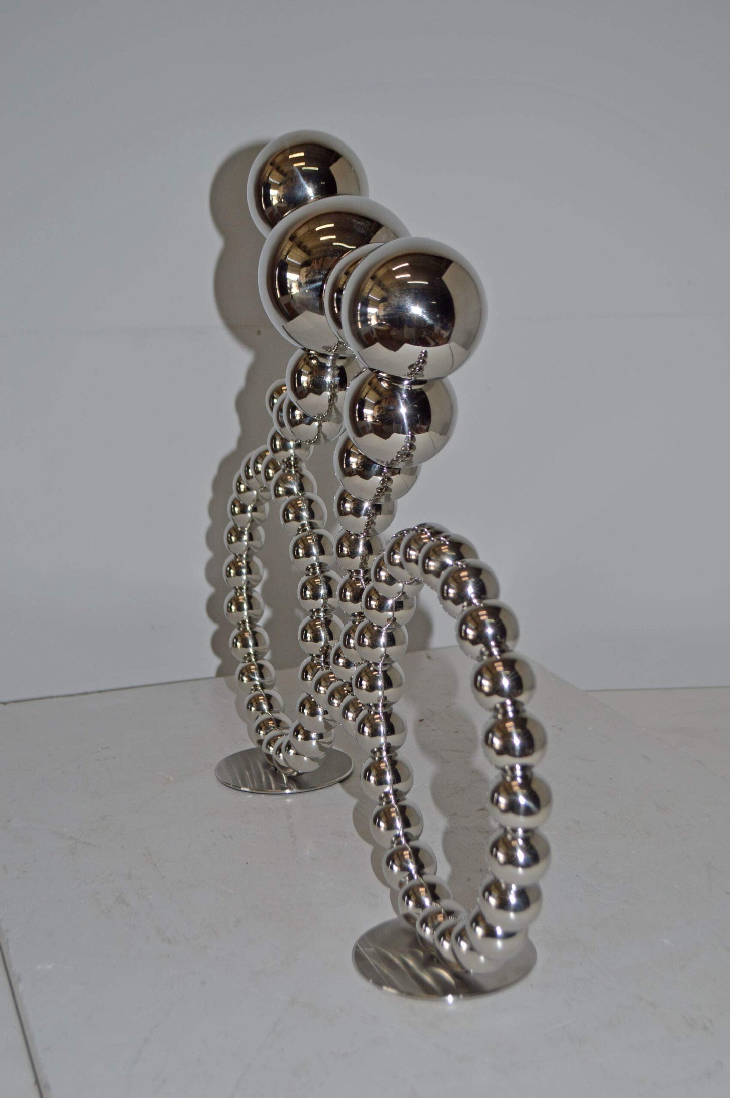 Modern Art Rider on His Bicycle Chrome Statue - Size: 22"L x 4"W x 17"H.