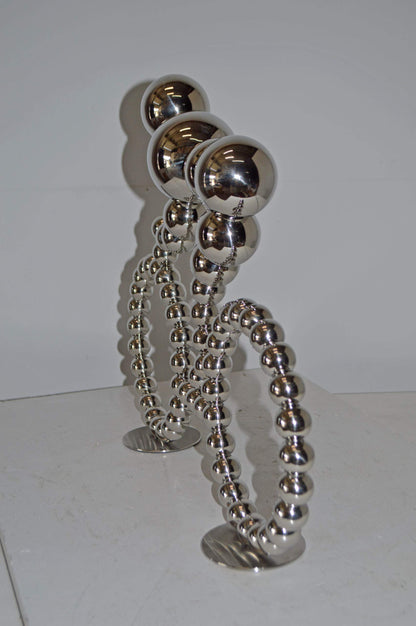 Modern Art Rider on His Bicycle Chrome Statue - Size: 22"L x 4"W x 17"H.