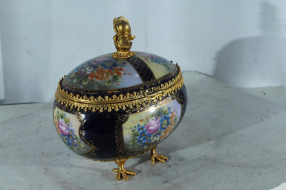 NIFAO Porcelain floral egg shaped lidded box with cherub and chicken feet 11"x8"x12"H