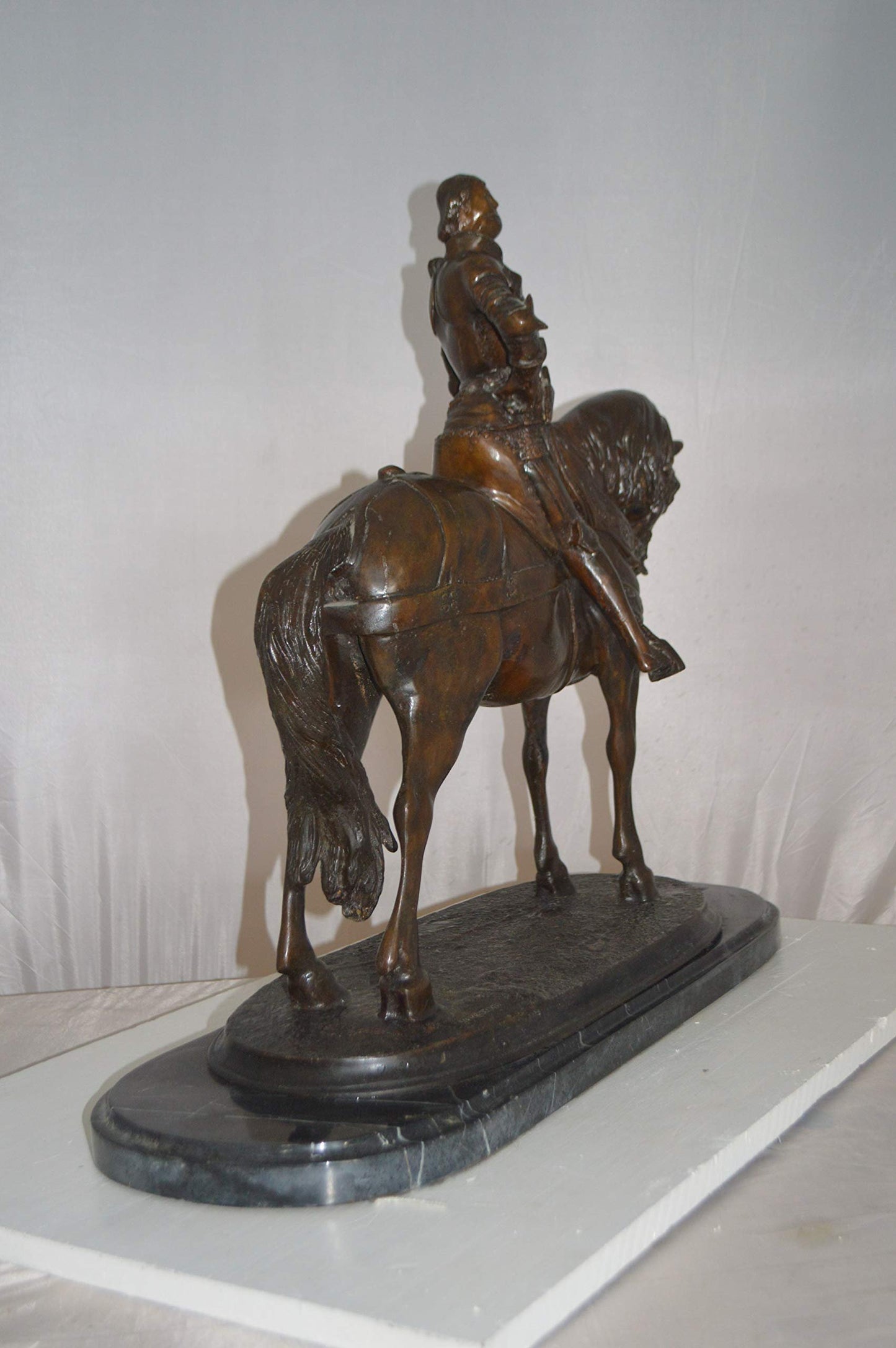 Man on his Horse Bronze Statue -  Size: 30"L x 10"W x 25"H.