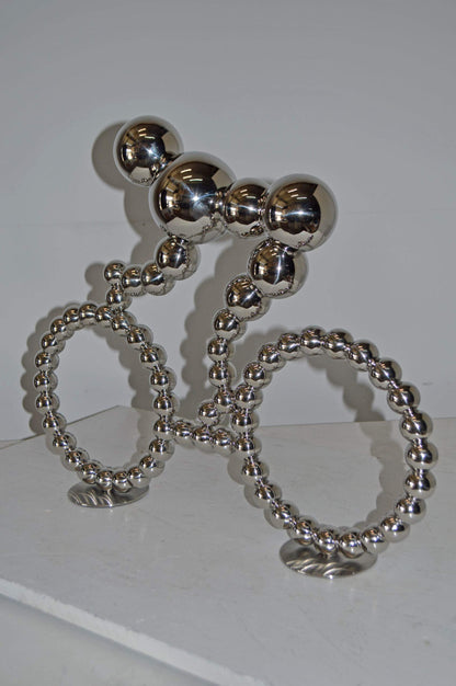 Modern Art Rider on His Bicycle Chrome Statue - Size: 22"L x 4"W x 17"H.