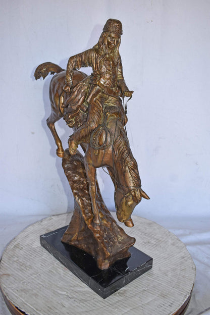 Remington replica Mountain Man bronze statue -  Size: 10"L x 4"W x 15"H.