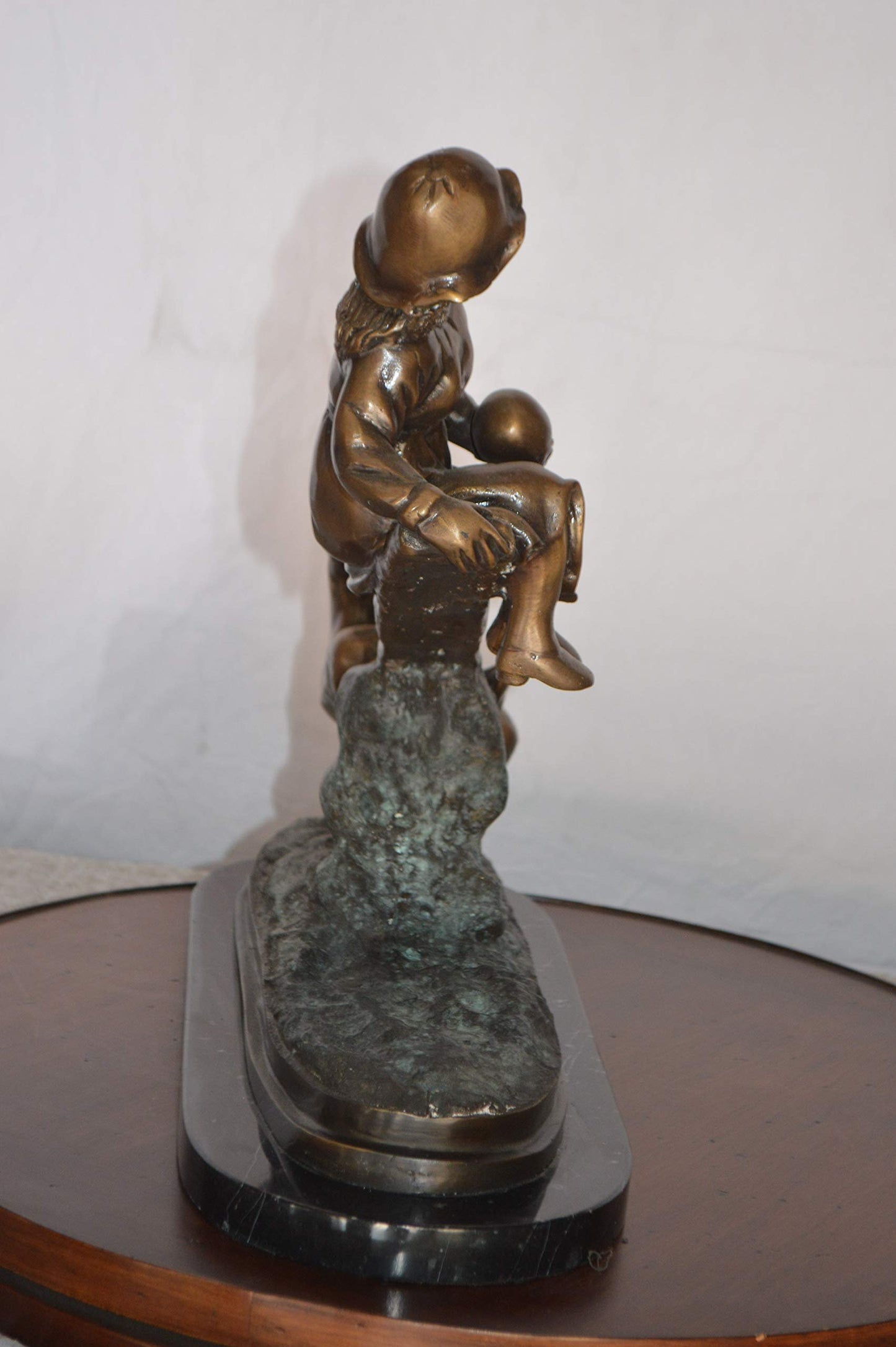 Boys Playing Seesaw on a Marble Base Bronze Statue -  Size: 22"L x 8"W x 17"H.