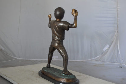 Young Quarterback bronze statue - Size: 14"L x 6"W x 20"H.
