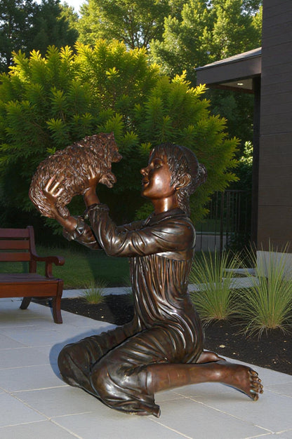 Girl Playing With Her Little Dog Bronze Statue -  Size: 22"L x 22"W x 30"H.