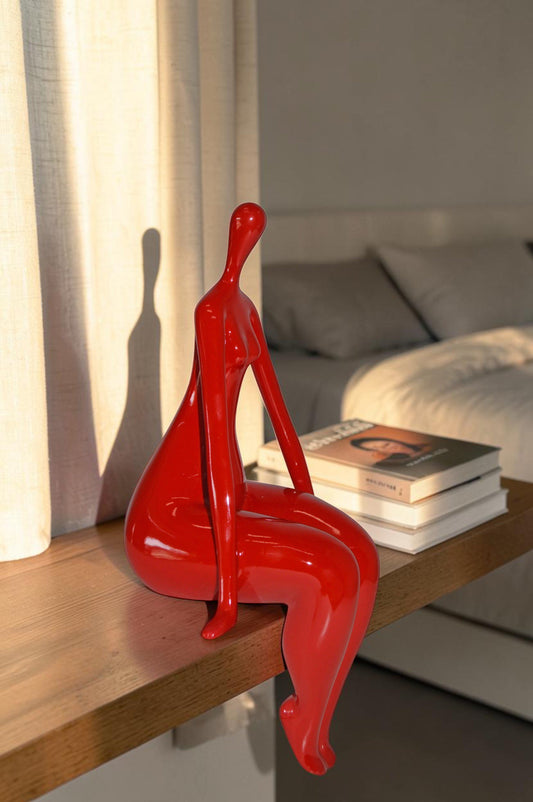 Modern Art Red Sitting on Edge Girl Made of Resin - Size: 8"L x 6"W x 15"H.