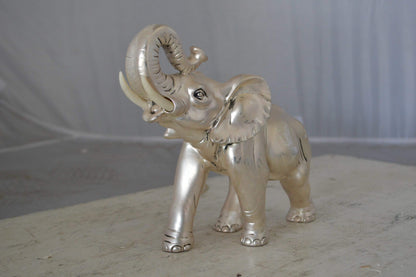 Elephant statue made of resin - Size: 9"L x 4"W x 8"H.