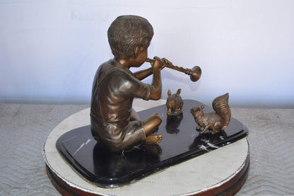 Boy With Rabbit And Squirrel Bronze Statue -  Size: 22"L x 13"W x 16"H.