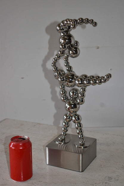 Modern Art of Acrobat Couple in Action Chrome Balls Statue Size: 6" x 8" x 18"H