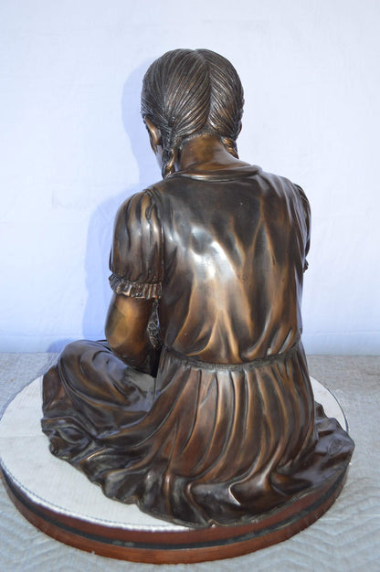 Sandra Sitting With Her Rabbit Bronze Statue -  Size: 25"L x 18"W x 25"H.