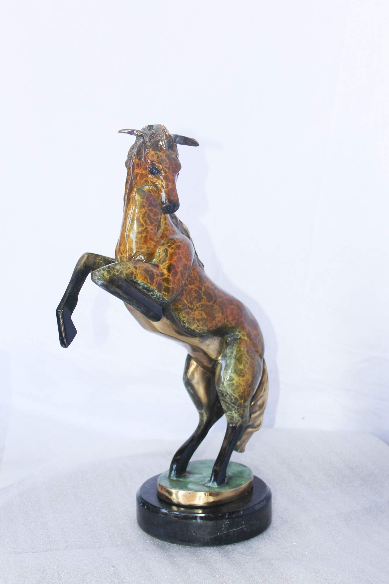 Colored rearing horse bronze statue -  Size: 14"L x 7"W x 21"H.