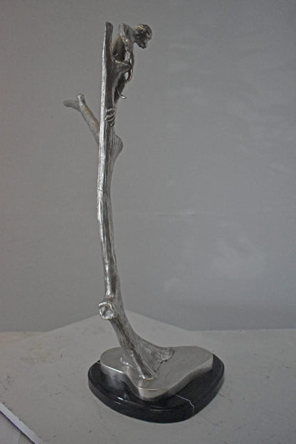 Monkey Resting on a Tree Silver Finish Bronze Statue - Size: 12" x 13" x 27"H.