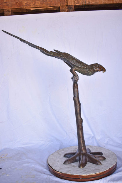 Parrot on a Tree looking Down Bronze Statue - Size: 37"L x 15"W x 47"H.