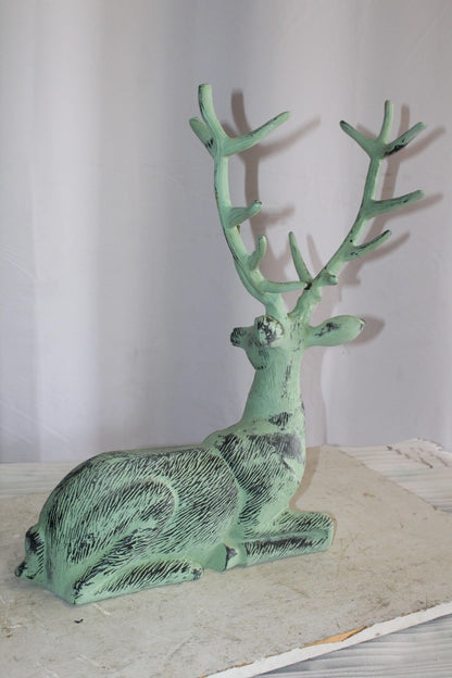 Aluminum Deer Statue Green Patina Resting on the ground 26" x 7" x 24"H