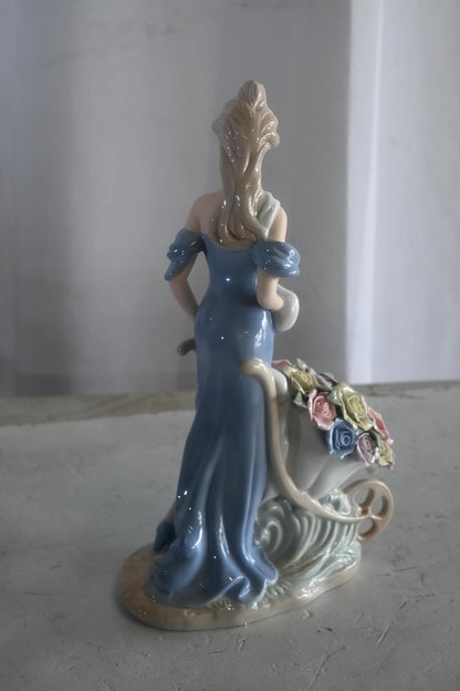 Porcelain Lady Blue Gown Pushing Rose Wheelbarrow Statue 8"x4"x14"H