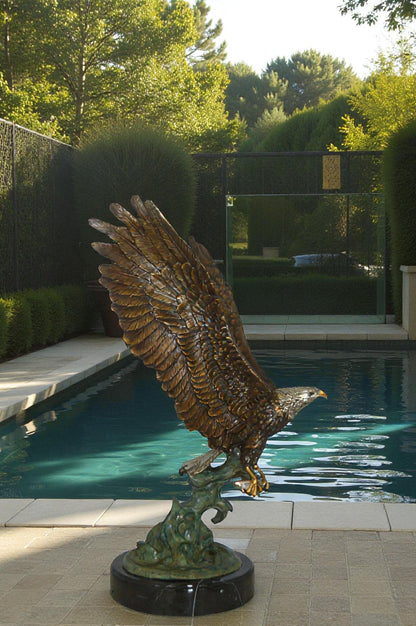 Eagle Catching His Prey from Water Bronze Statue -  Size: 14"L x 13"W x 26"H.