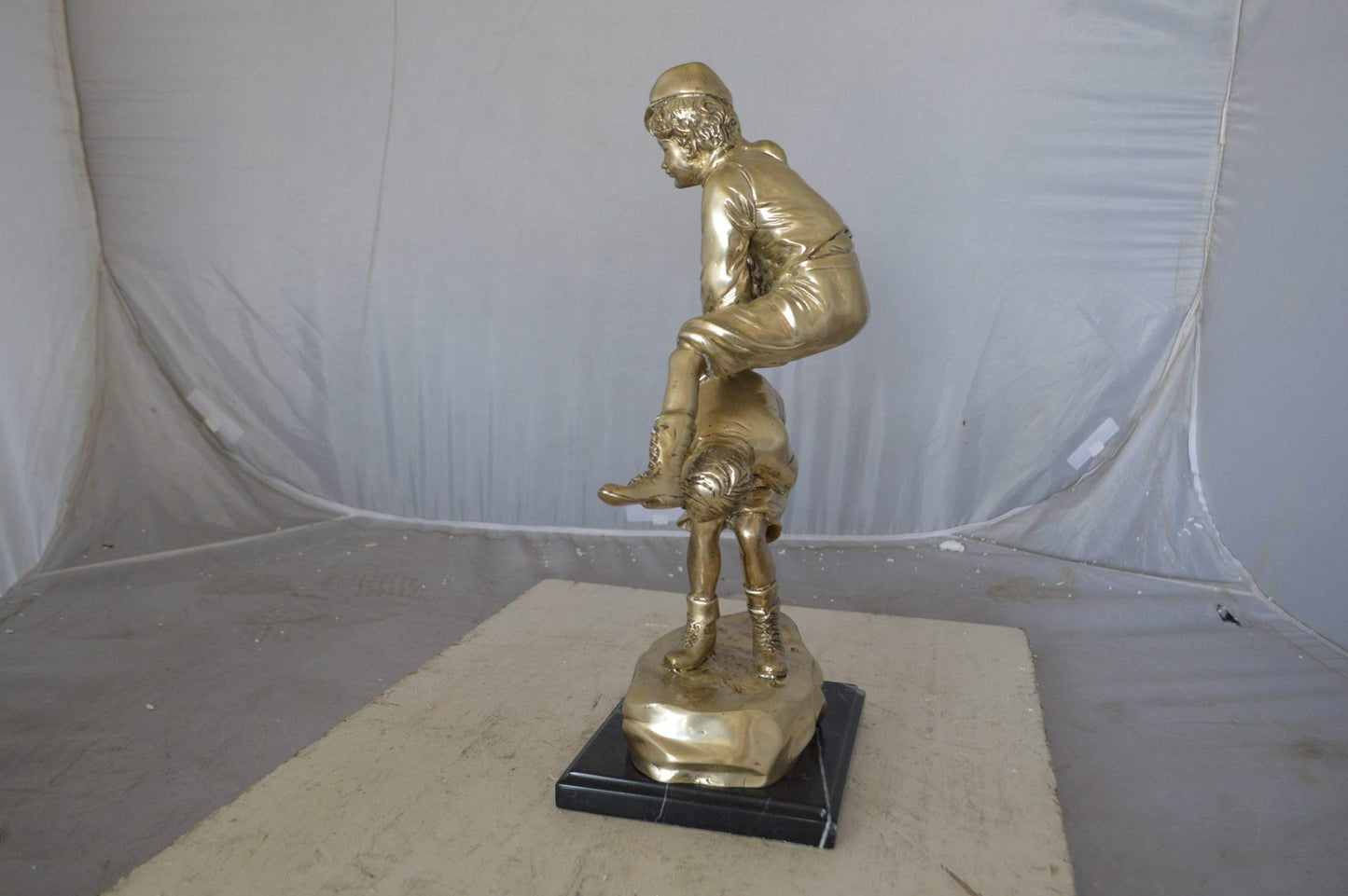 Leapfrog bronze statue silver finish  - Size: 12"L x 7"W x 19"H.