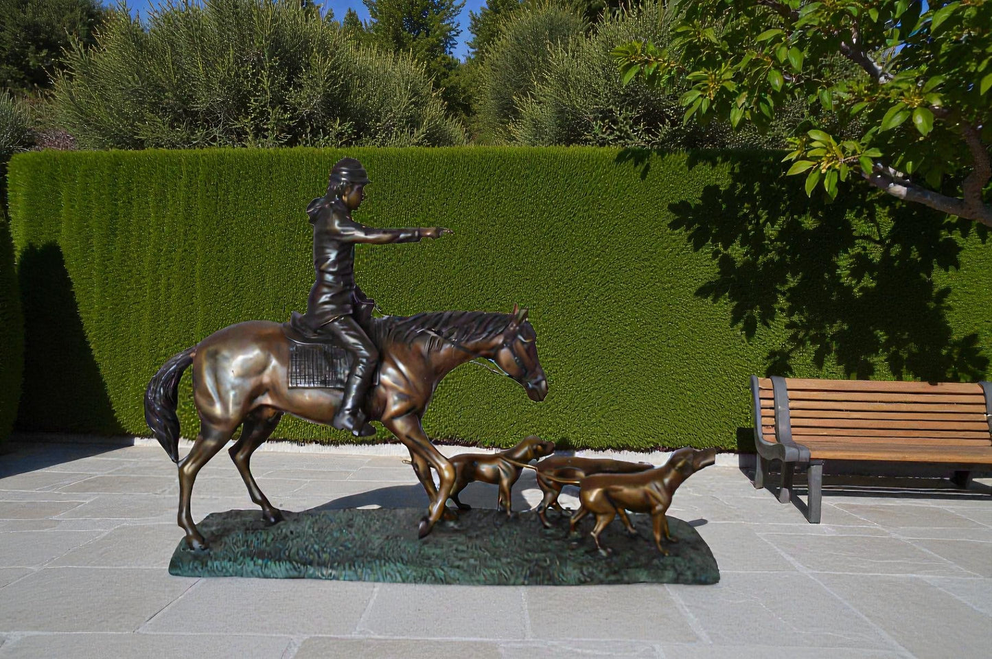 Hunter with 3 dogs Bronze Statue -  Size: 26"L x 8"W x 19"H.