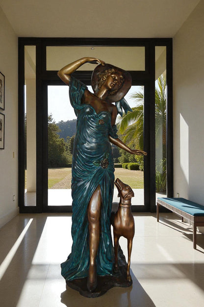 Lady With Her Dog Bronze Statue -  Size: 25"L x 22"W x 50"H.
