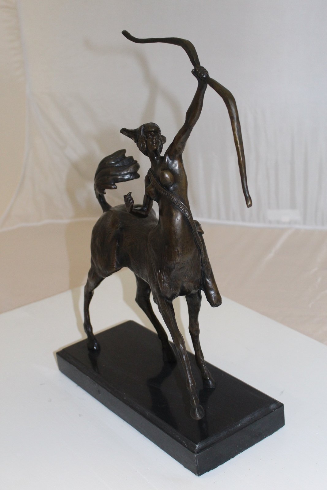 horse woman shooting an arrow Bronze Statue -  Size: 14"L x 6"W x 20"H.