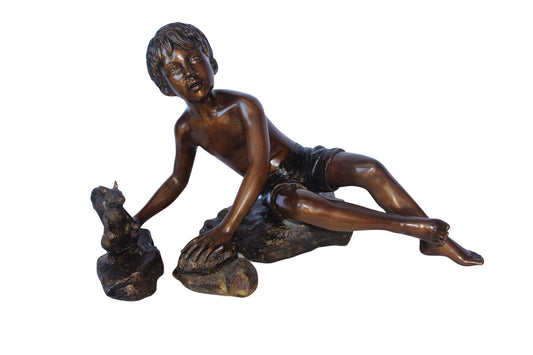 Adventurous boy with squirrel bronze statue -  Size: 36"L x 18"W x 22"H.