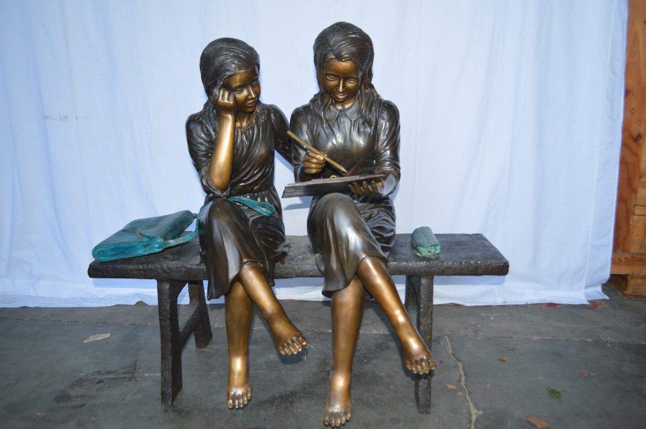 Two Schoolgirls Sitting On a Bench Bronze Statue -  Size: 45"L x 24"W x 41"H.