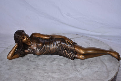 Gorgeous Young Lady Laying on The Ground Bronze Statue - Size: 5"L x 21"W x 5"H.
