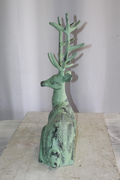 Aluminum Deer Statue Green Patina Resting on the ground 26" x 7" x 24"H