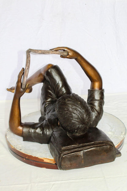 Nifao Bronze Boy Reading Statue – Large Handcrafted Lost Wax Sculpture of Young Boy Lying Back with Book – Detailed Child Figurine for Study, Library, Garden, or Home Déco 41" x 22" x 18"H