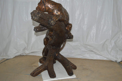 Two Jaguars On A Tree Bronze Statue - Size: 66"L x 34"W x 44"H.