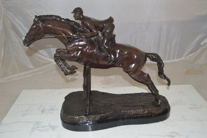 Jockey With Horse Jumping Over Hurdle Bronze Statue Medium  23"L x 10"W x 16"H.