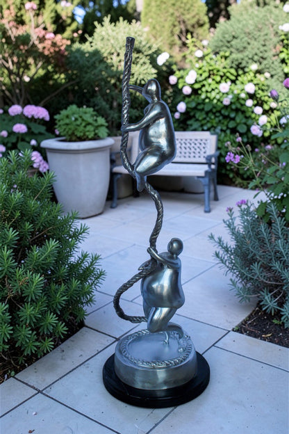 Two Voluptuous Women Climbing a Rope Statue, Silver Finish 10" x 10" x 29"H