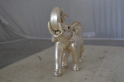 Elephant statue made of resin - Size: 9"L x 4"W x 8"H.