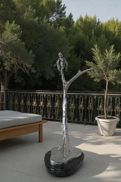 Monkey Resting on a Tree Silver Finish Bronze Statue - Size: 12" x 13" x 27"H.